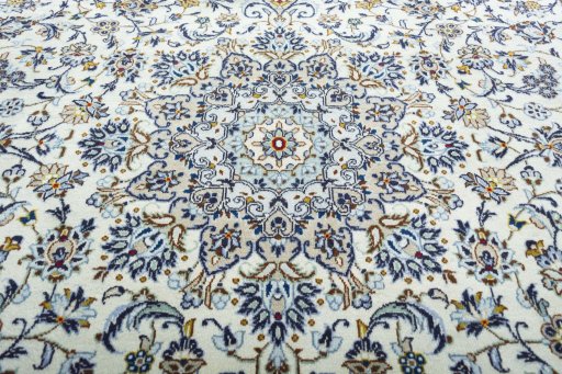 Central medallion detail of 2000s Kashan rug from Iran / Persia