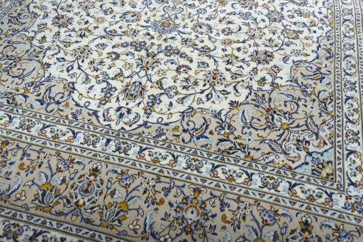 Close-up detail of 2000s Kashan rug from Iran / Persia showing Wool weave
