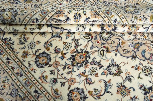 Close-up detail of 2000s Kashan rug from Iran / Persia showing Wool weave