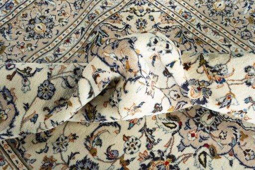 Surface texture of 2000s Kashan rug with natural Wool and intricate pattern