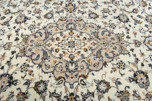 Central medallion detail of 2000s Kashan rug from Iran / Persia