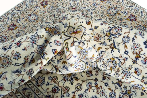 Surface texture of 2000s Kashan rug with natural Wool and intricate pattern