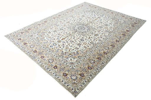 Corner detail of 2000s Kashan rug showing border pattern and Wool pile
