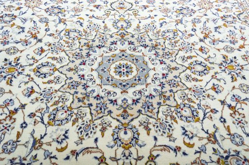Central medallion detail of 2000s Kashan rug from Iran / Persia