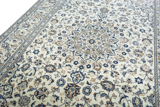 Backside of handmade 2000s Kashan rug showing knot structure and weave density