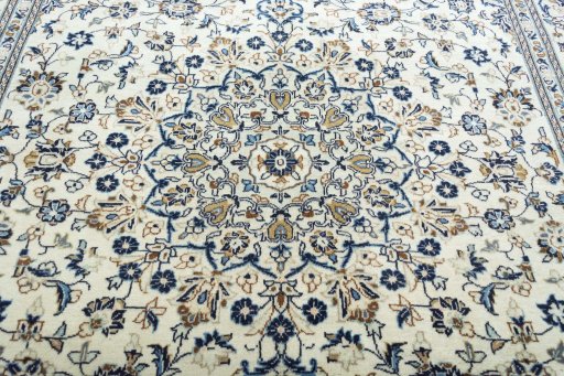 Central medallion detail of 2000s Kashan rug from Iran / Persia