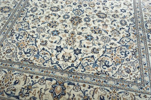 Close-up detail of 2000s Kashan rug from Iran / Persia showing Wool weave