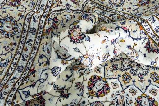 Surface texture of 2000s Kashan rug with natural Wool and intricate pattern