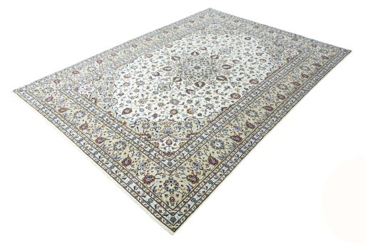 Corner detail of 2000s Kashan rug showing border pattern and Wool pile