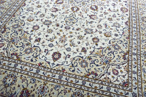 Close-up detail of 2000s Kashan rug from Iran / Persia showing Wool weave