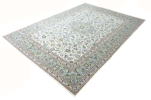 Corner detail of 2000s Kashan rug showing border pattern and Wool pile