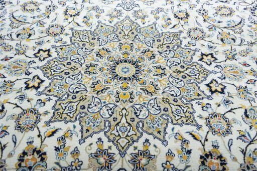 Central medallion detail of 2000s Kashan rug from Iran / Persia