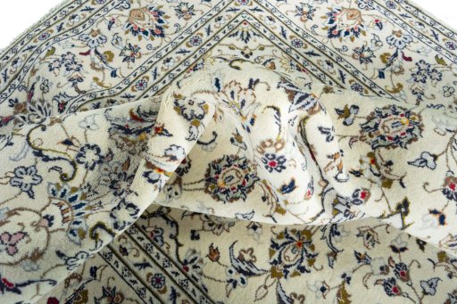 Close-up detail of 2000s Kashan rug from Iran / Persia showing Wool weave