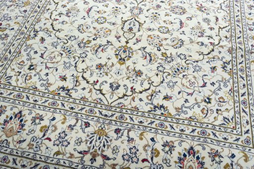 Close-up detail of 2000s Kashan rug from Iran / Persia showing Wool weave