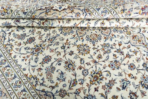Close-up detail of 2000s Kashan rug from Iran / Persia showing Wool weave