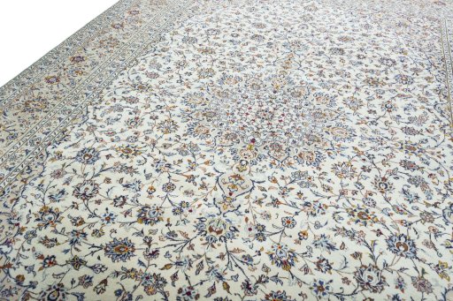 Backside of handmade 2000s Kashan rug showing knot structure and weave density