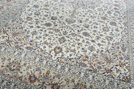 Close-up detail of 2000s Kashan rug from Iran / Persia showing Wool weave