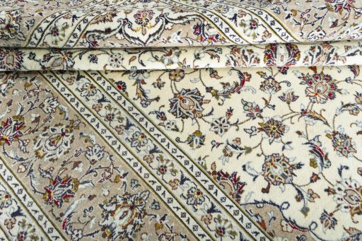 Close-up detail of 2000s Kashan rug from Iran / Persia showing Wool weave