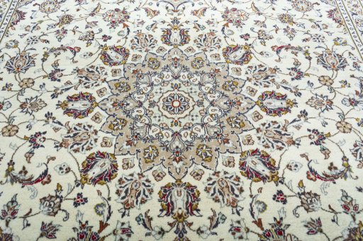Central medallion detail of 2000s Kashan rug from Iran / Persia