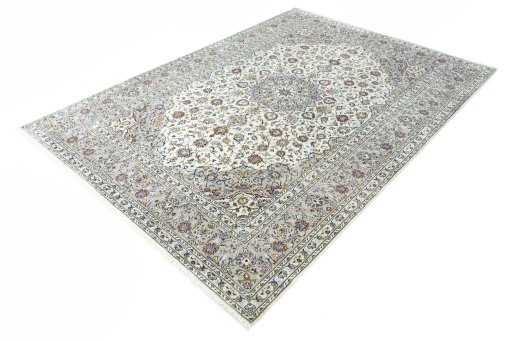 Corner detail of 2000s Kashan rug showing border pattern and Wool pile