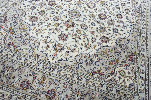 Close-up detail of 2000s Kashan rug from Iran / Persia showing Wool weave