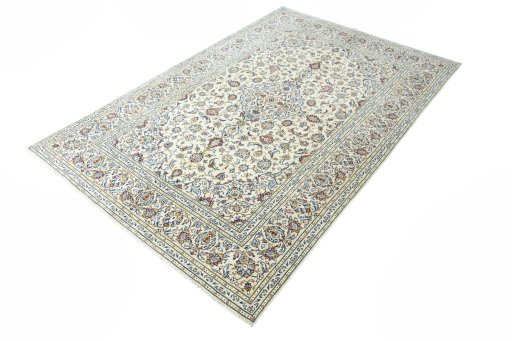 Corner detail of 2000s Kashan rug showing border pattern and Wool pile