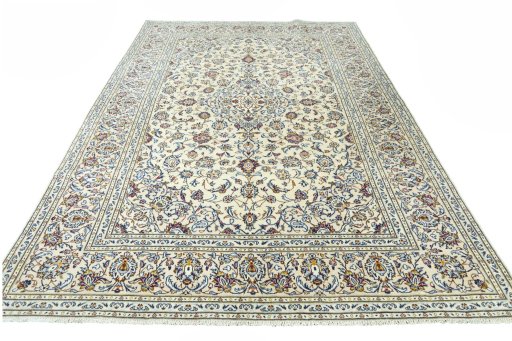 Surface texture of 2000s Kashan rug with natural Wool and intricate pattern
