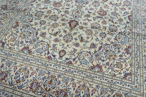 Close-up detail of 2000s Kashan rug from Iran / Persia showing Wool weave