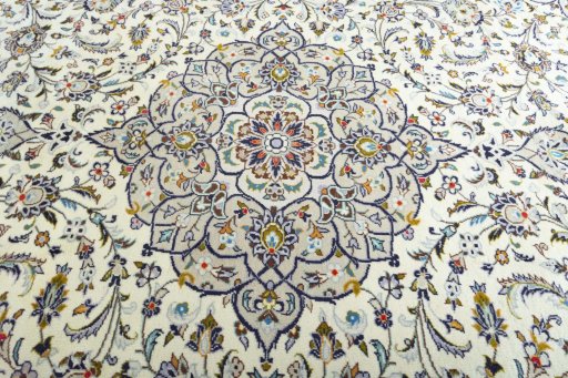 Central medallion detail of 2000s Kashan rug from Iran / Persia