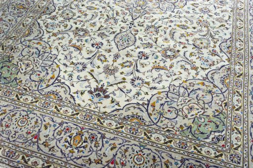 Close-up detail of 2000s Kashan rug from Iran / Persia showing Wool weave