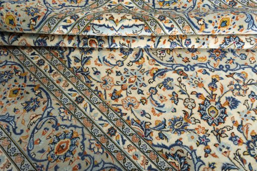 Close-up detail of 2000s Kashan rug from Iran / Persia showing Wool weave