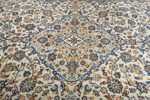 Central medallion detail of 2000s Kashan rug from Iran / Persia