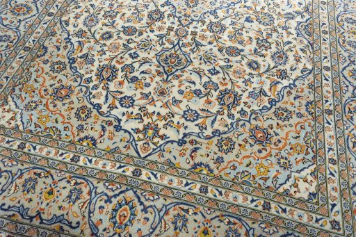 Close-up detail of 2000s Kashan rug from Iran / Persia showing Wool weave