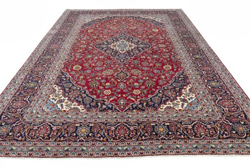 Surface texture of 2000s Kashan rug with natural Wool and intricate pattern