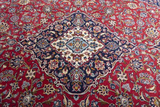 Central medallion detail of 2000s Kashan rug from Iran / Persia