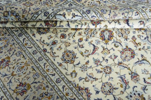 Close-up detail of 2000s Kashan rug from Iran / Persia showing Wool weave