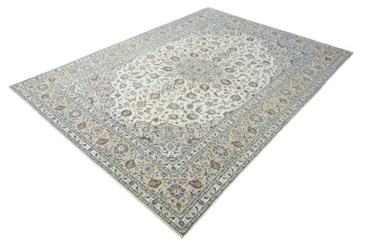 Corner detail of 2000s Kashan rug showing border pattern and Wool pile