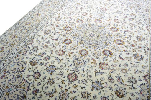Backside of handmade 2000s Kashan rug showing knot structure and weave density