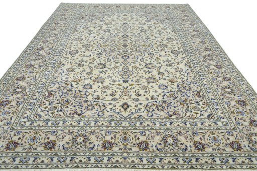 Surface texture of 2000s Kashan rug with natural Wool and intricate pattern