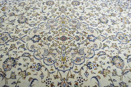 Central medallion detail of 2000s Kashan rug from Iran / Persia