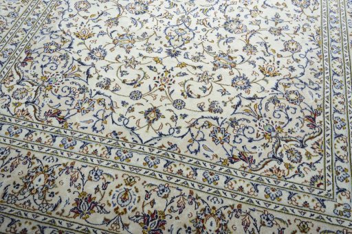 Close-up detail of 2000s Kashan rug from Iran / Persia showing Wool weave