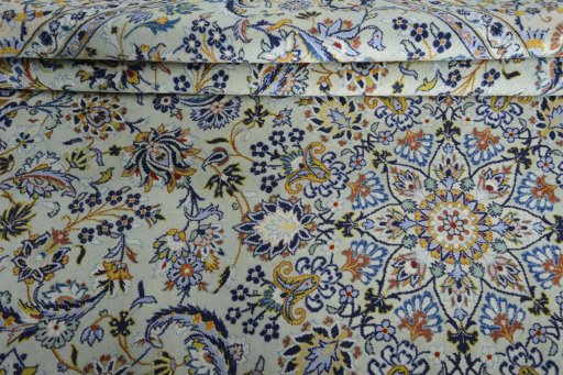 Close-up detail of 2000s Kashan rug from Iran / Persia showing Wool weave