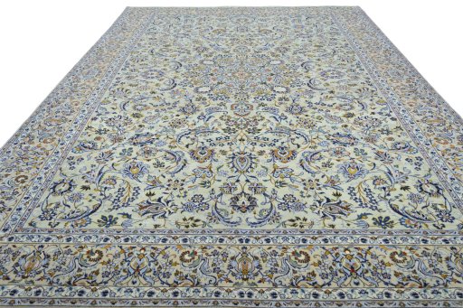 Surface texture of 2000s Kashan rug with natural Wool and intricate pattern