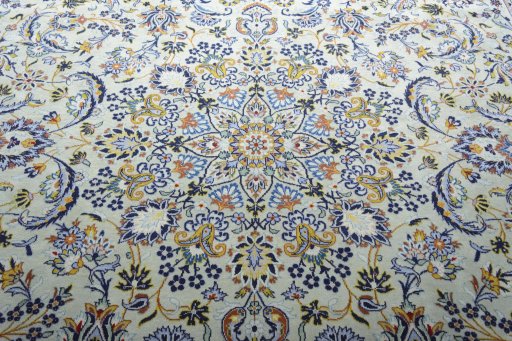 Central medallion detail of 2000s Kashan rug from Iran / Persia
