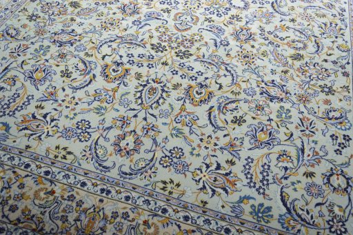 Close-up detail of 2000s Kashan rug from Iran / Persia showing Wool weave