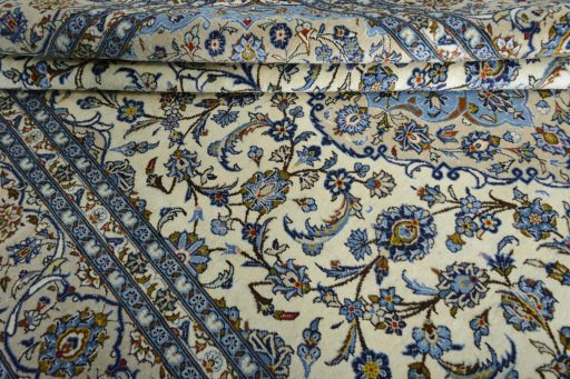 Close-up detail of 2000s Kashan rug from Iran / Persia showing Wool weave