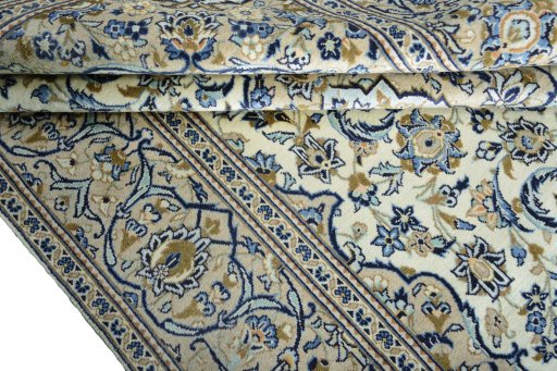 Close-up detail of 2000s Kashan rug from Iran / Persia showing Wool weave