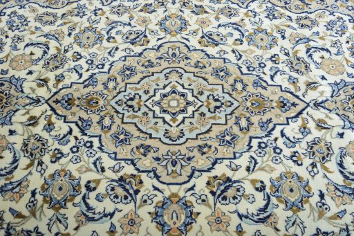 Central medallion detail of 2000s Kashan rug from Iran / Persia