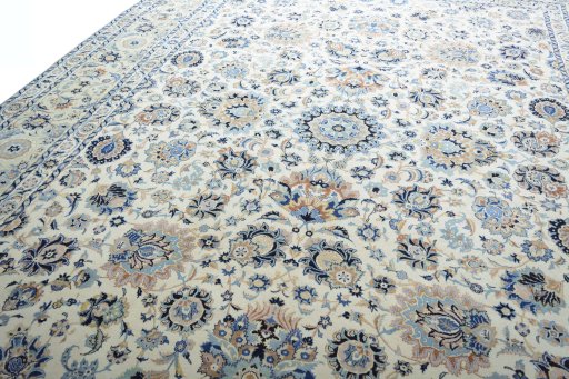 Backside of handmade 1950s Kashan rug showing knot structure and weave density