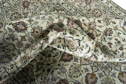Surface texture of 2000s Kashan rug with natural Wool and intricate pattern